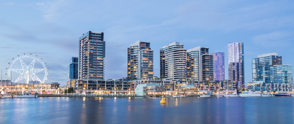 Apartment towers along the waterfront at dusk